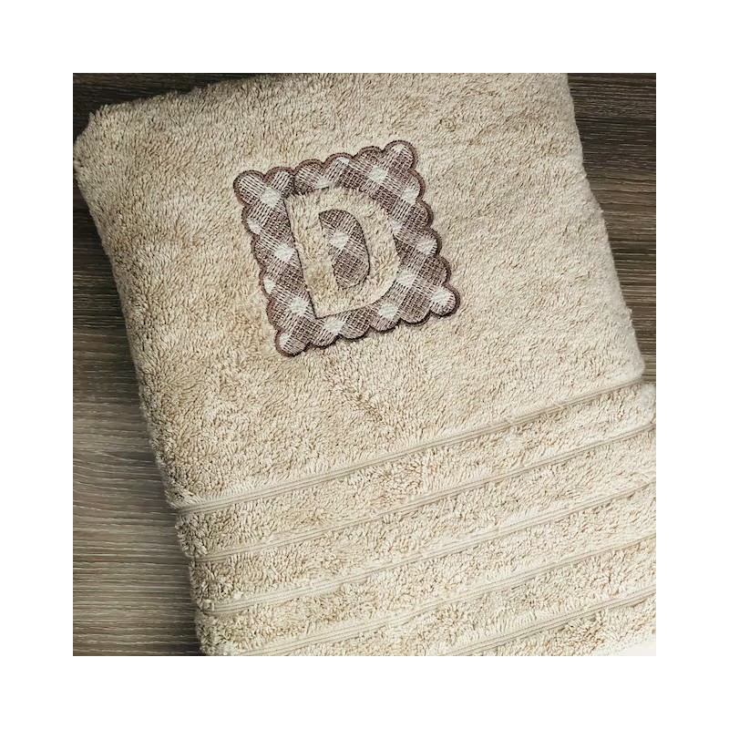 Serviette de toilette avec broderie embossée Serviette de toilette avec broderie embossée